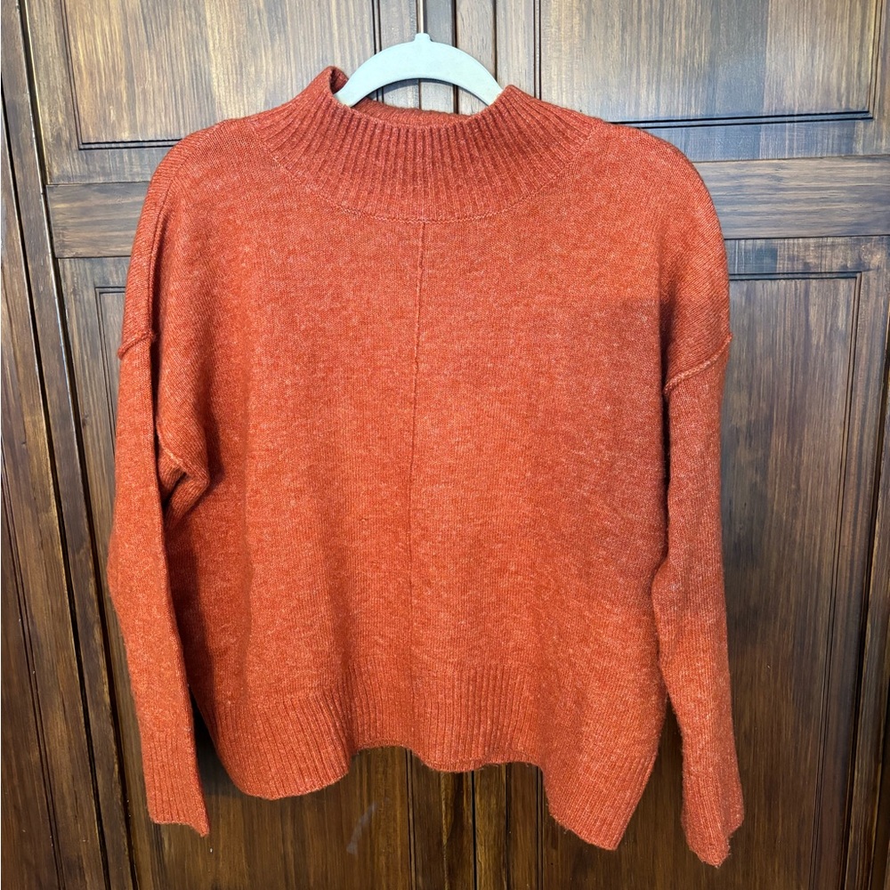 Rust orange turtle neck sweater. Size XS.